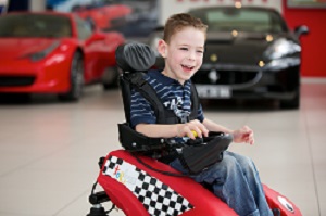 Picture of toddler in Wizzybug pediatric mobility device Picture of toddler in Wizzybug pediatric mobility device